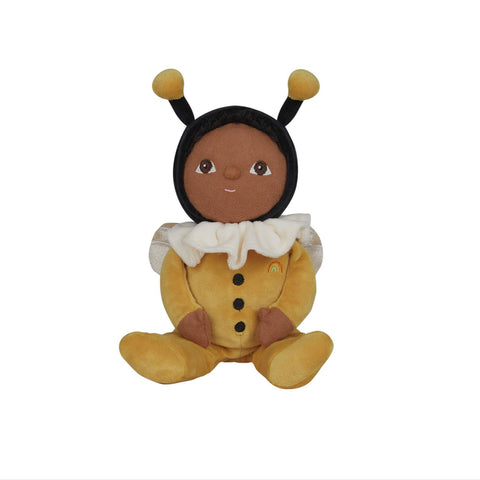 Toy figure of a child in a bee costume on a white background