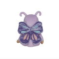 Small plush toy with purple butterfly wings on a white background