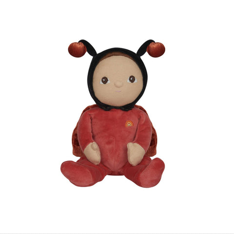 Plush toy in a red outfit with black hair on a white background