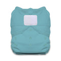 Blue cloth diaper with a white patch on a white background