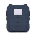 Navy blue cloth diaper with a white patch on a white background