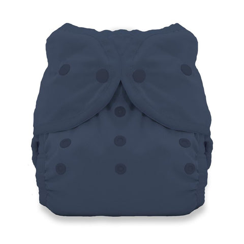 Navy blue diaper cover with button closures on a white background